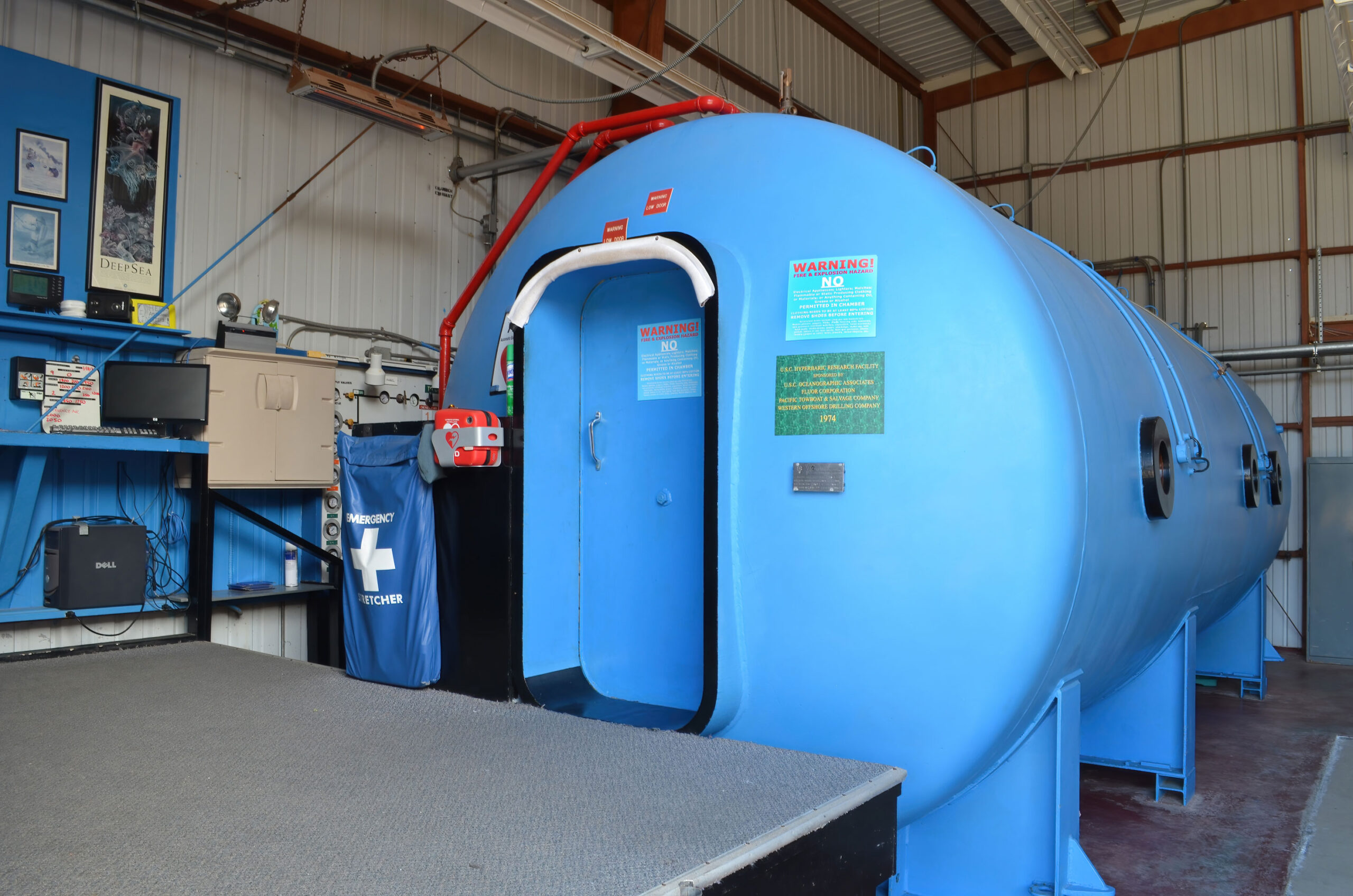 the Catalina Hyperbaric Chamber, a blue cylindrical room designed for treating dive accidents
