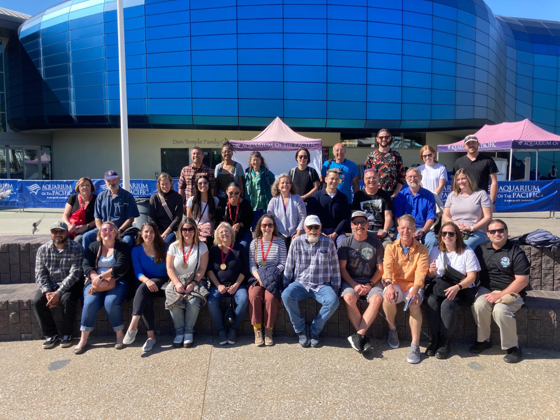 Wrigley Institute staff pose for a group photo in front of the Aquarium of the Pacific